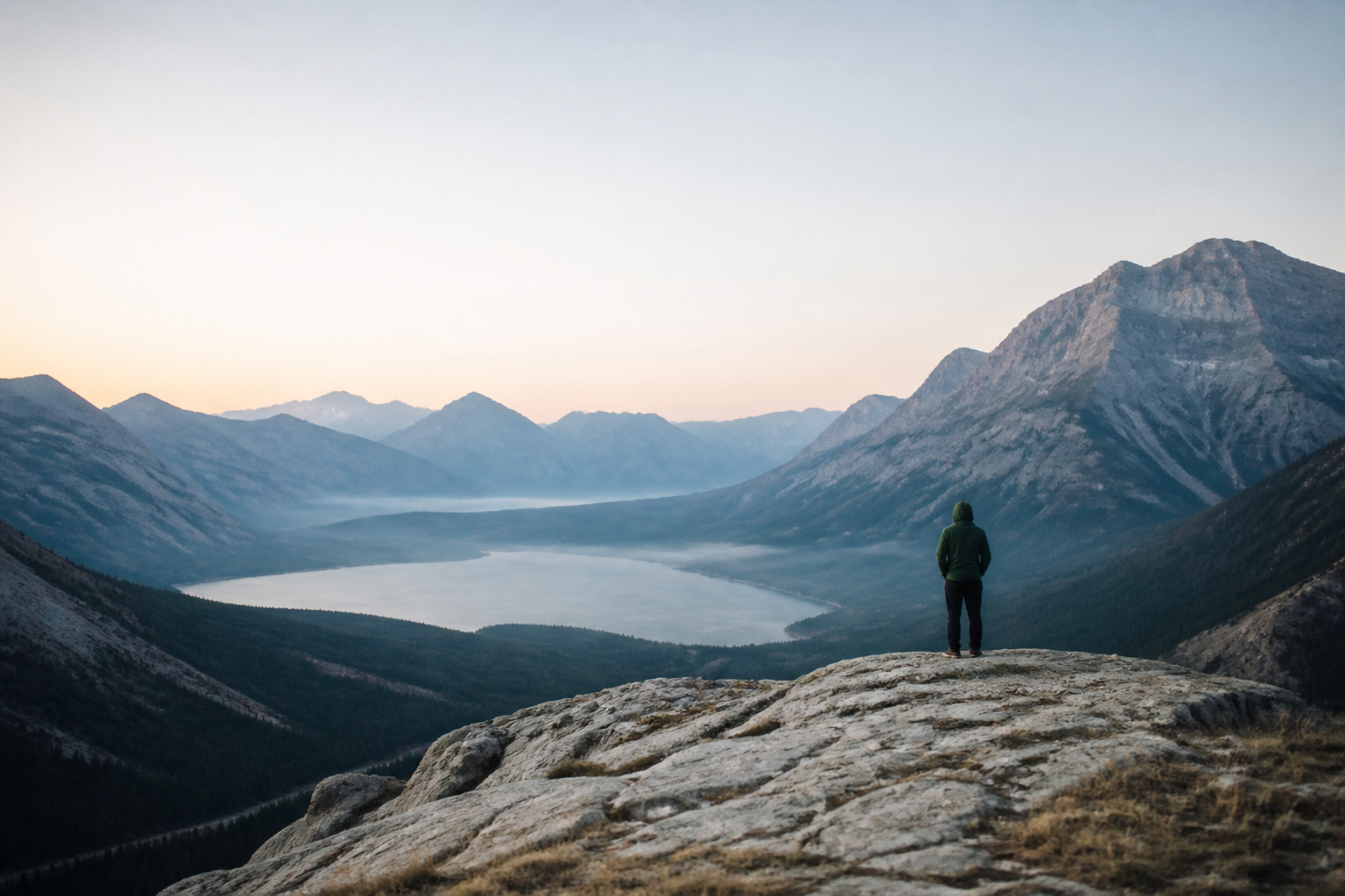 A person looking across the Canadian Rockies